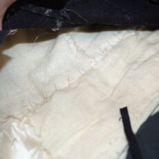 This is a photograph revealing the interior lining of the Lieutenant-Governor uniform.