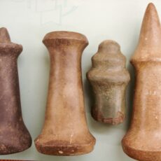 This is a photograph of stone hand mauls used in woodworking.