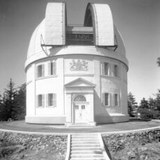 Completed dome with shutters open. Elevated view from south of the Dominion Astrophysical Observatory showing the entire dome, front entrance and steps.