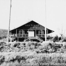 The Sikh temple in Paldi, BC, photographed from a distance, showing the surrounding landscape.
